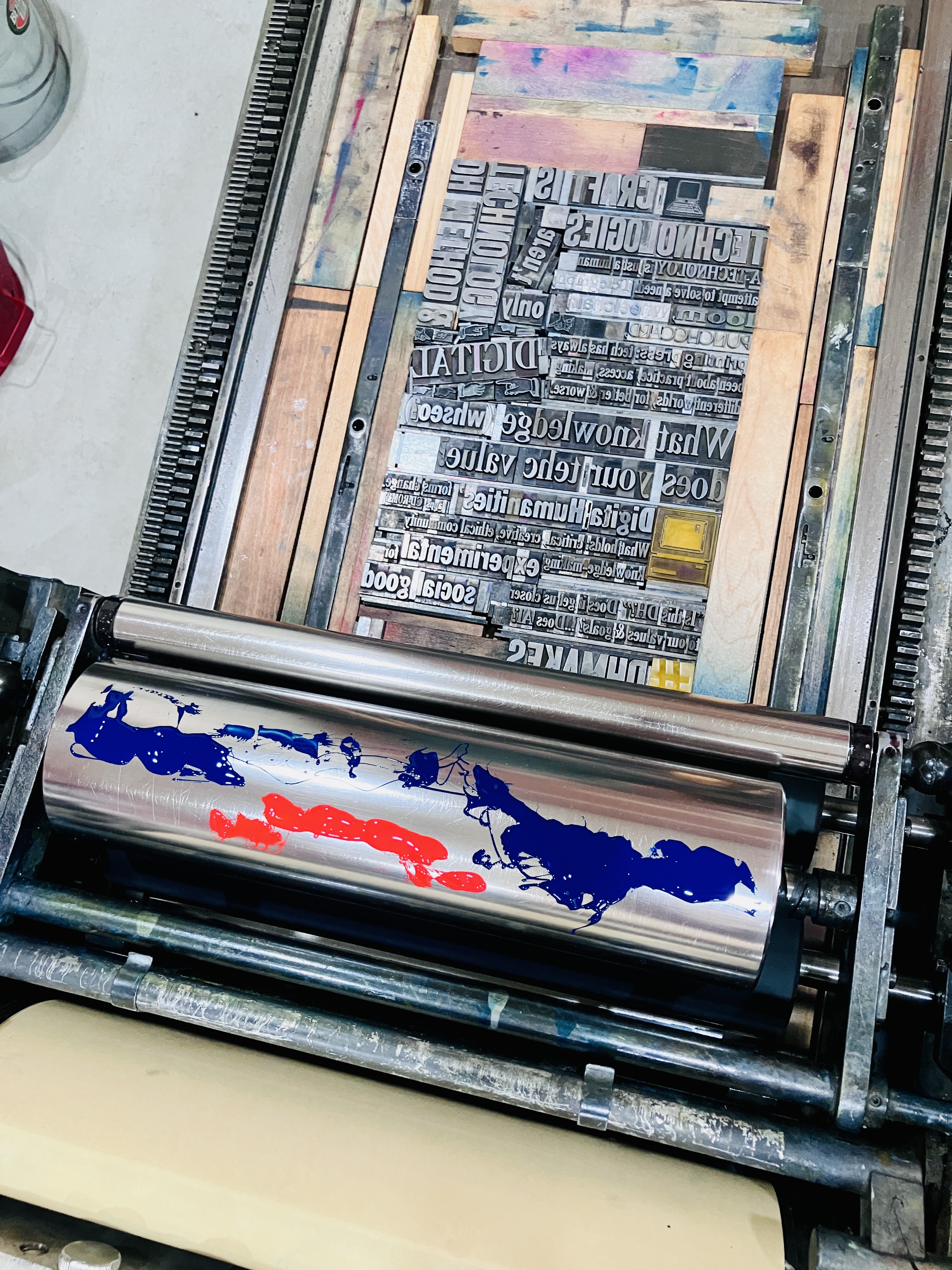 Photo of inking the press for this print
